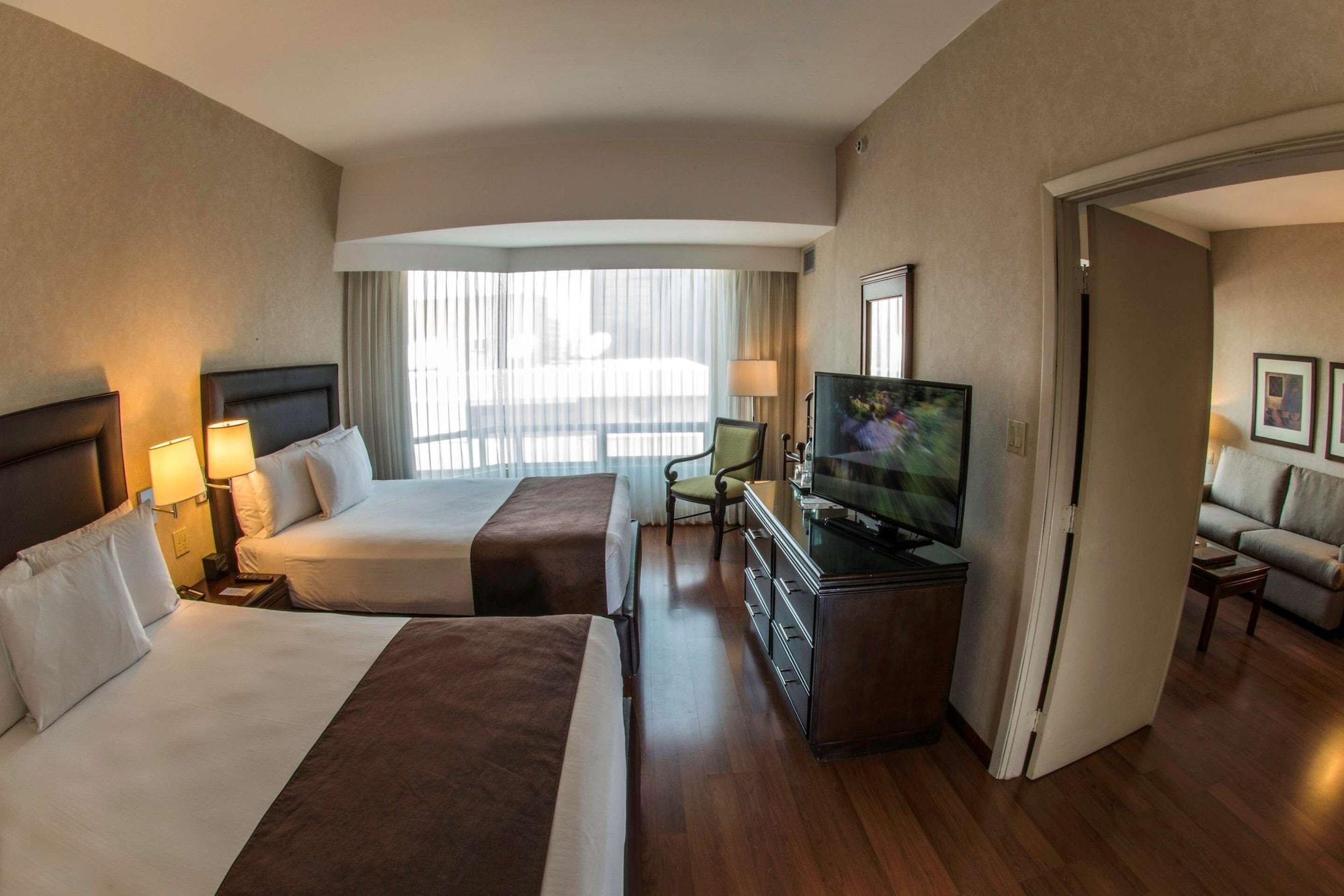 Clarion Suites Ville de Guatemala Extérieur photo A typical hotel room